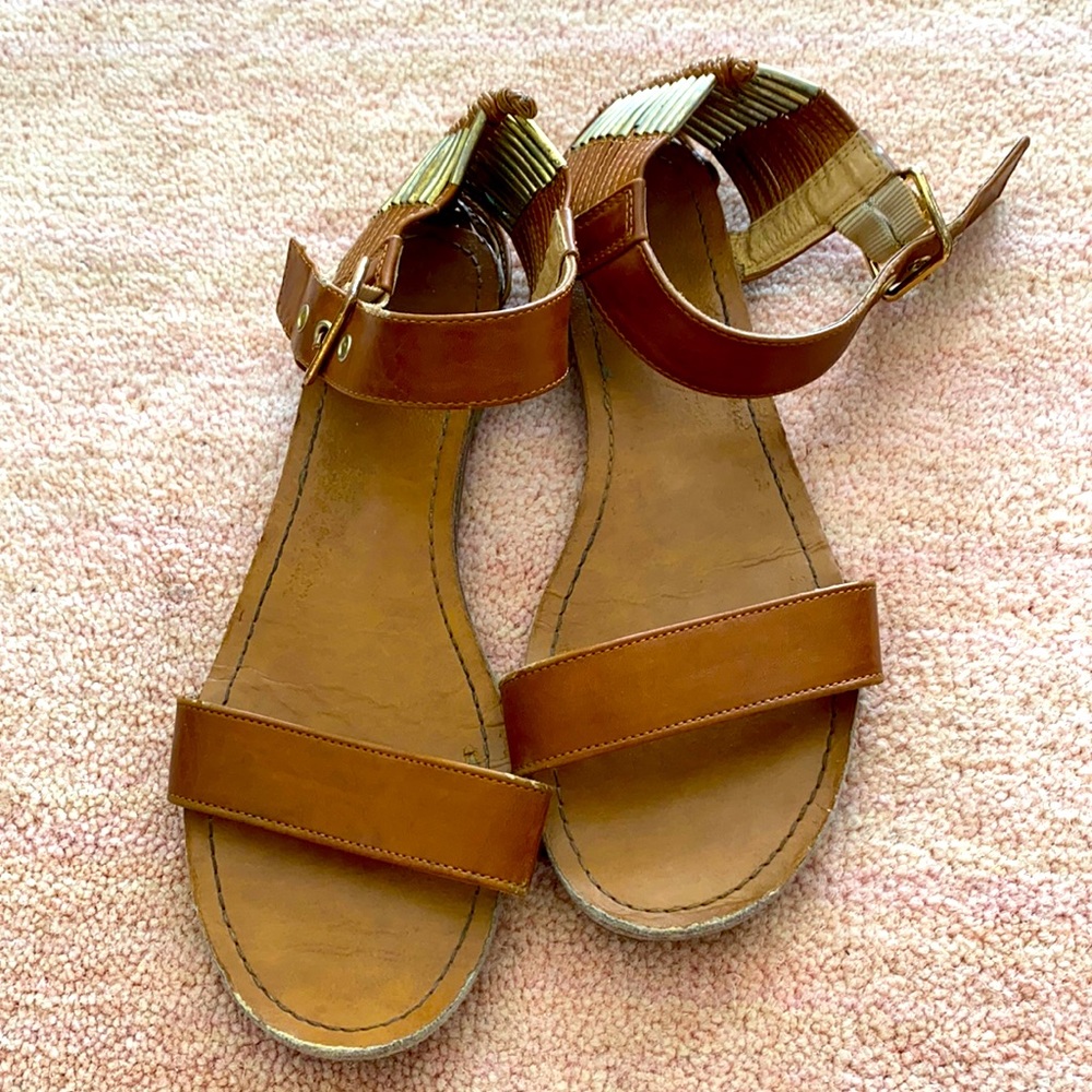 Brown sandals with gold detailing
